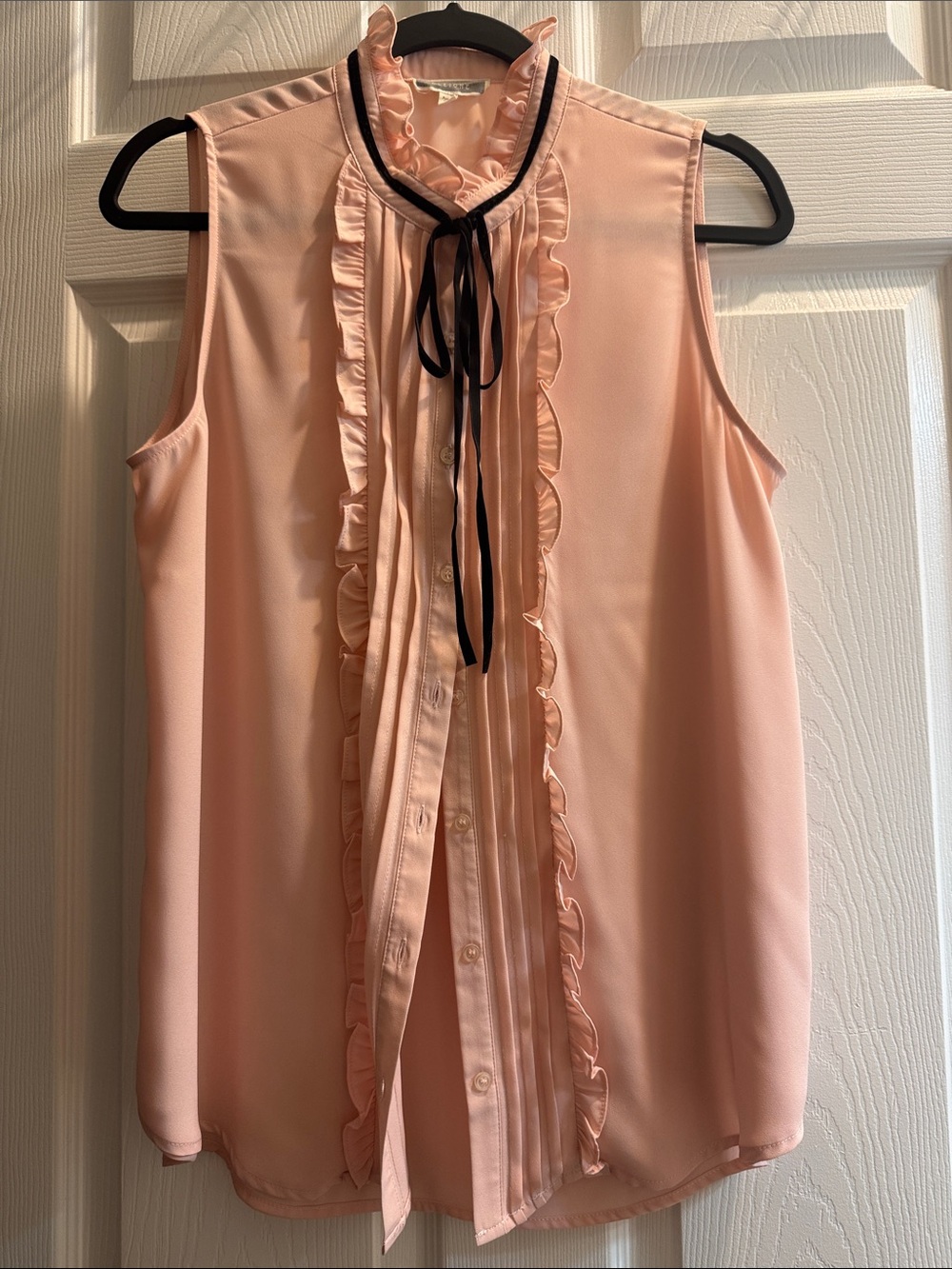 Pleione Sleeveless Ruffle Tie-Neck Blouse - Light Pink with Black Trim